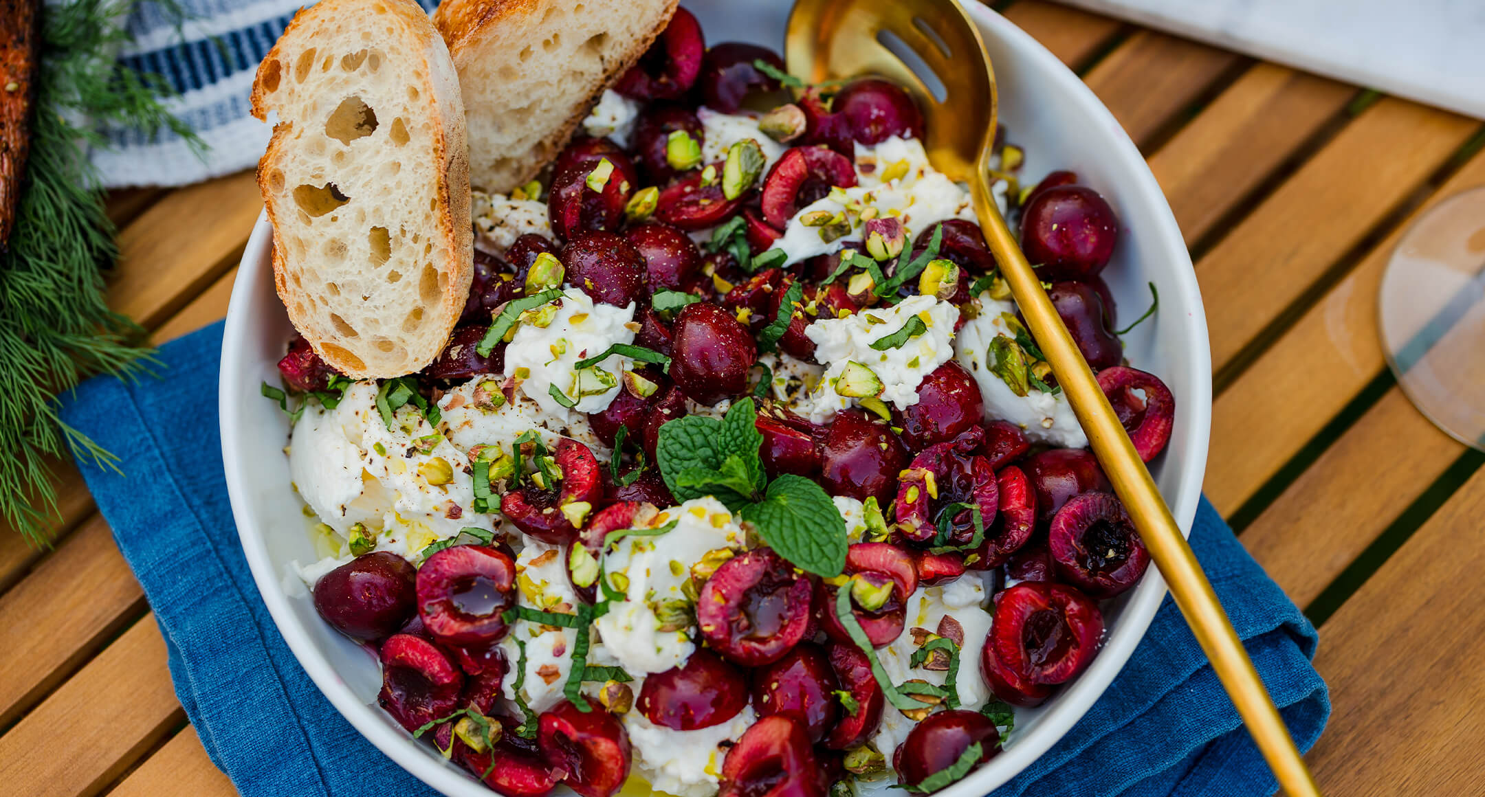 cherries with burrata and pistachios