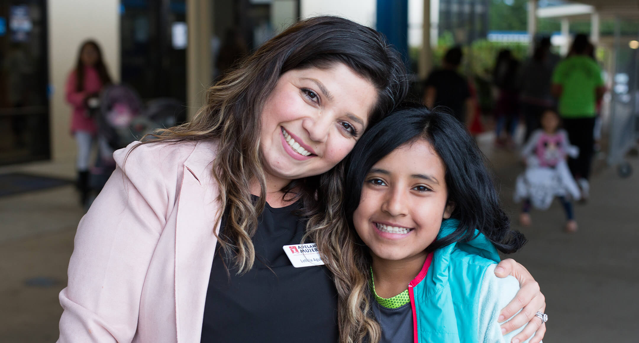 Leticia Aguilar, Associate Director of Education at Adelante Mujeres,    with a girl from our Chicas Youth Development program. 