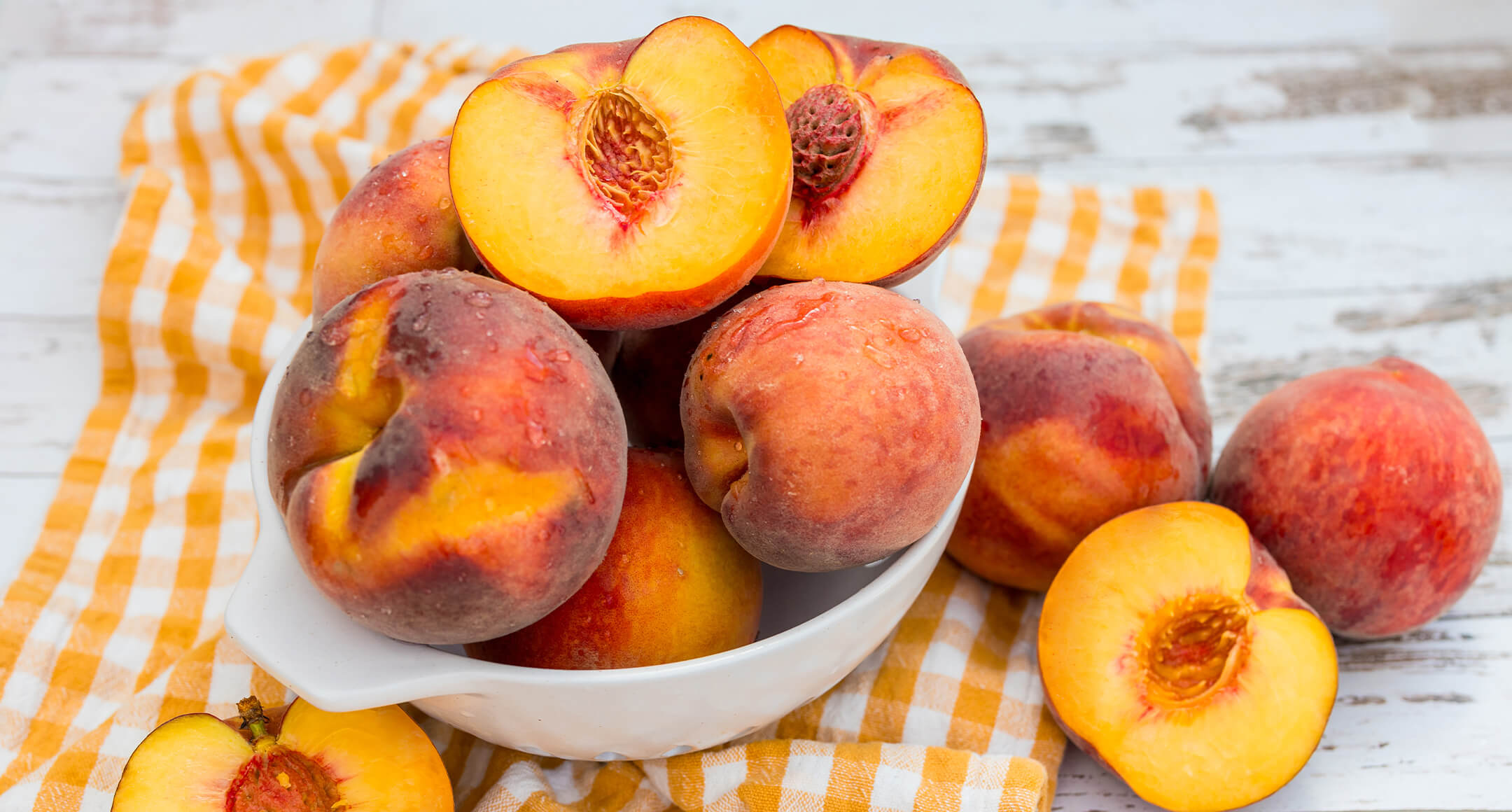 Fresh, local peaches in a bowl