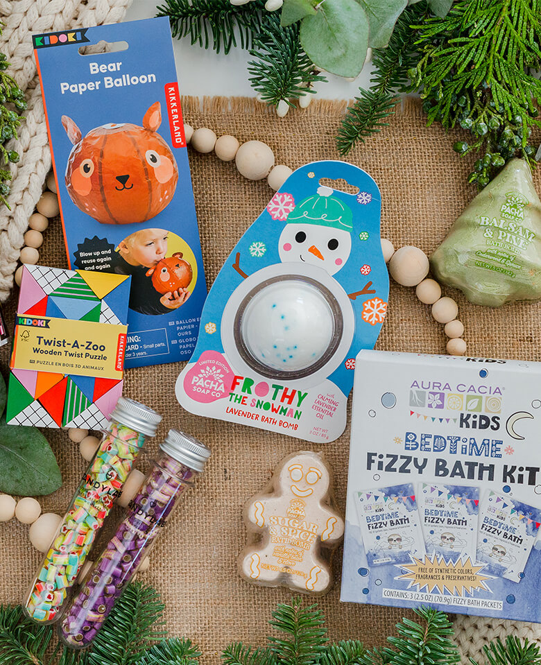 Stocking stuffers including toys and bath bombs.
