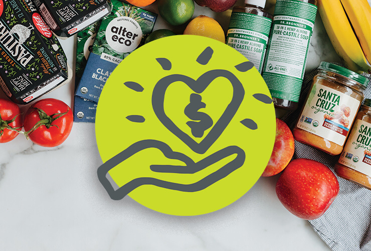 Rewards gifting illustrated icon of a hand holding a heart overlayed on an image of a variety of grocery items