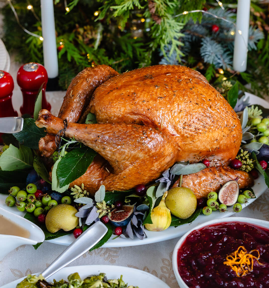 A whole roasted turkey on a serving platter