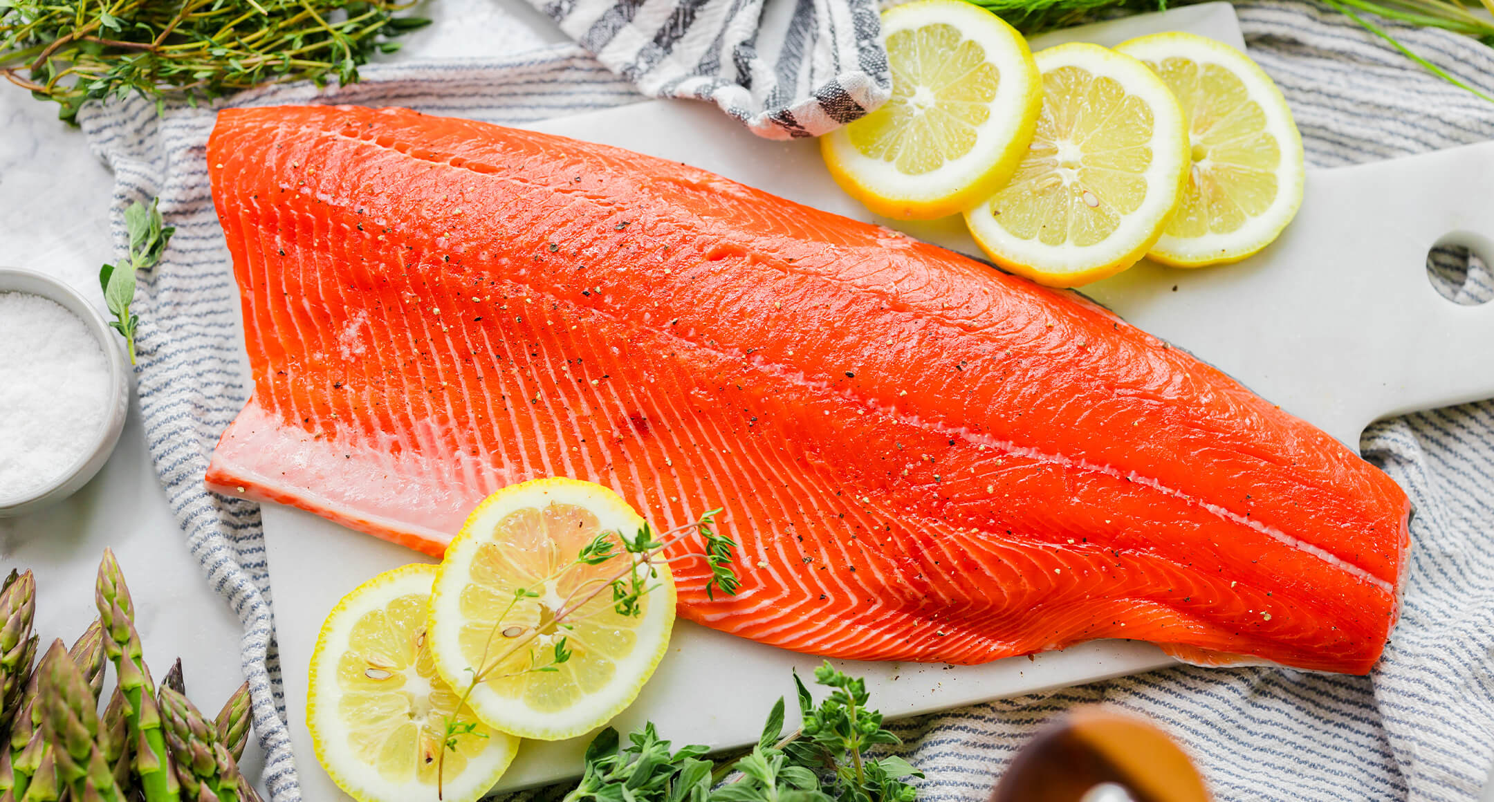A fresh Sockeye salmon fillet on a plate.