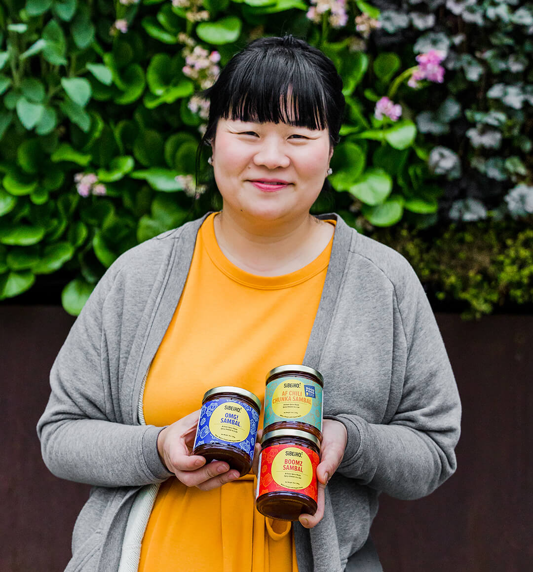 Holly Ong, co-founder of Sibeiho Holding three of their signature sambals. 