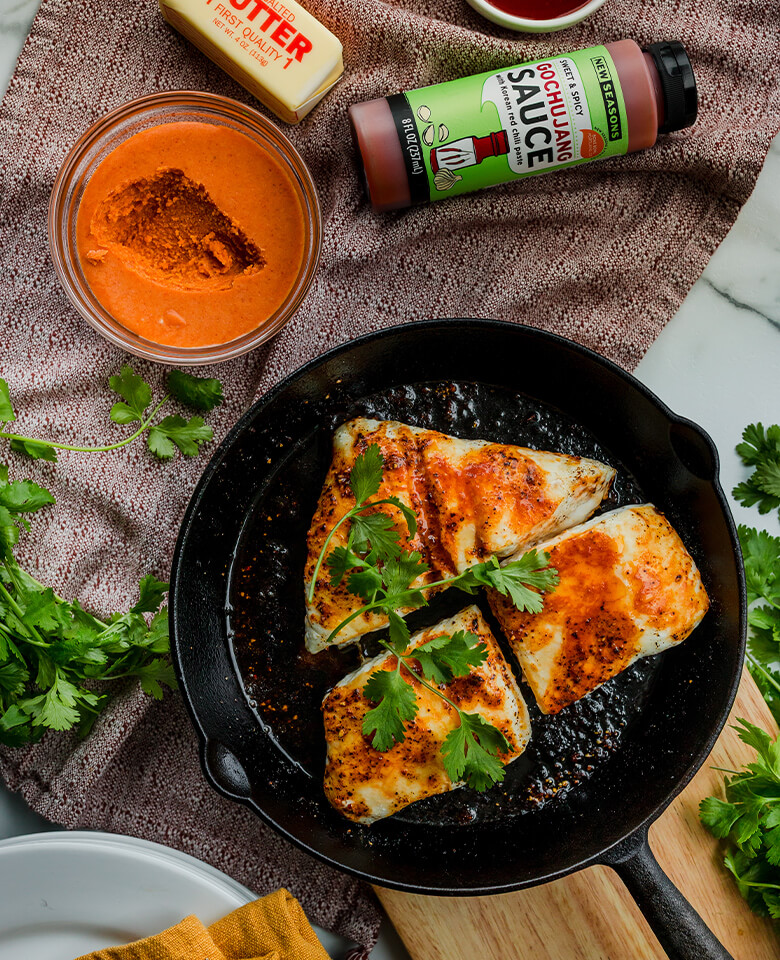 Halibut with New Seasons gochujang butter in a cast iron skillet