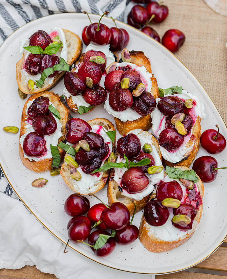 a photo of the recipe for grilled crostini with goat cheese and cherry compote