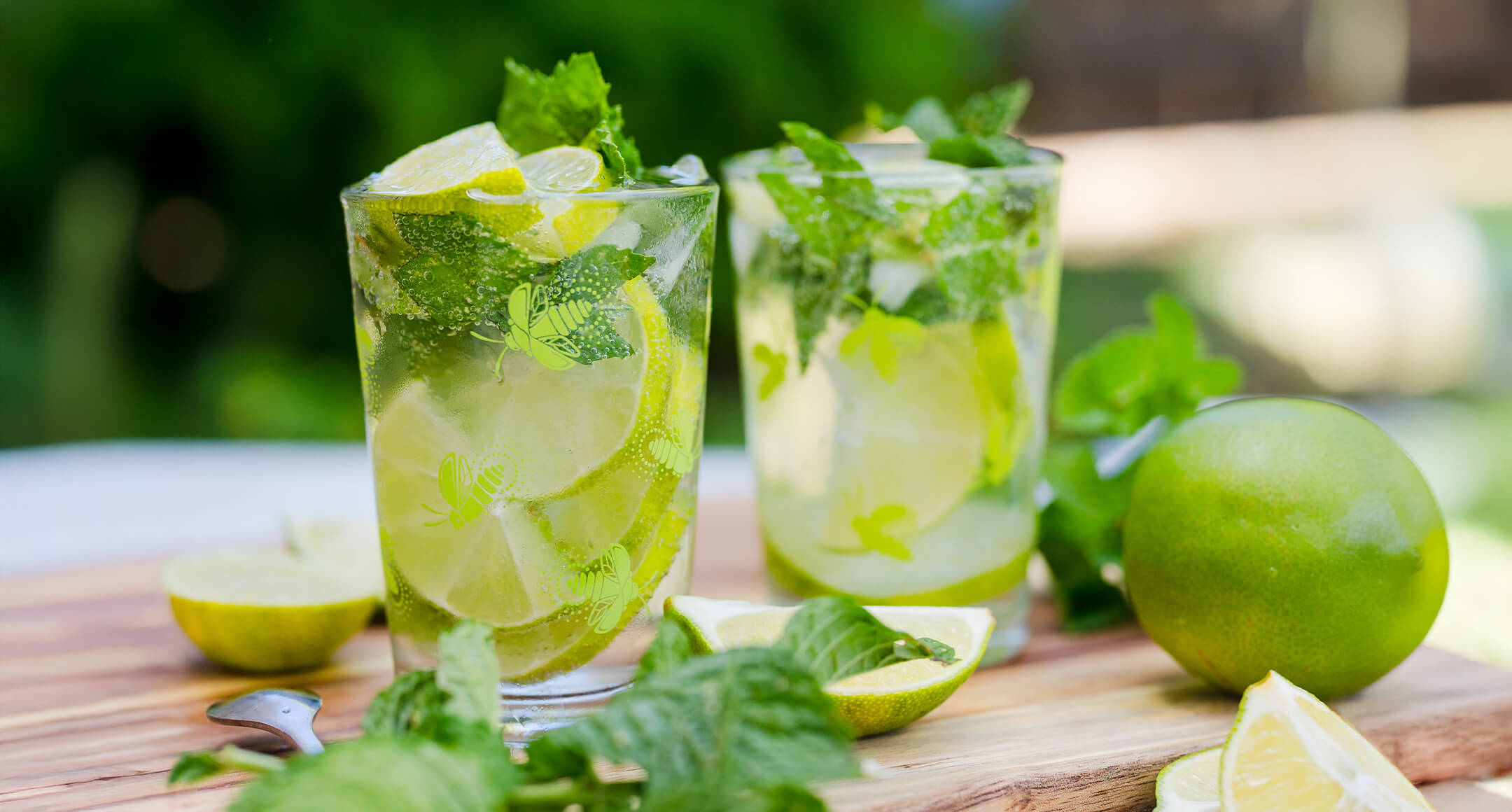A refreshing spring mojito drink with fresh lime and mint.