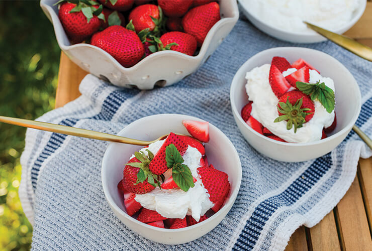 Fresh strawberries with whipped cream.