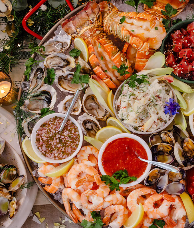 a seafood platter with shrimp, caviar, lobster, oysters and more!