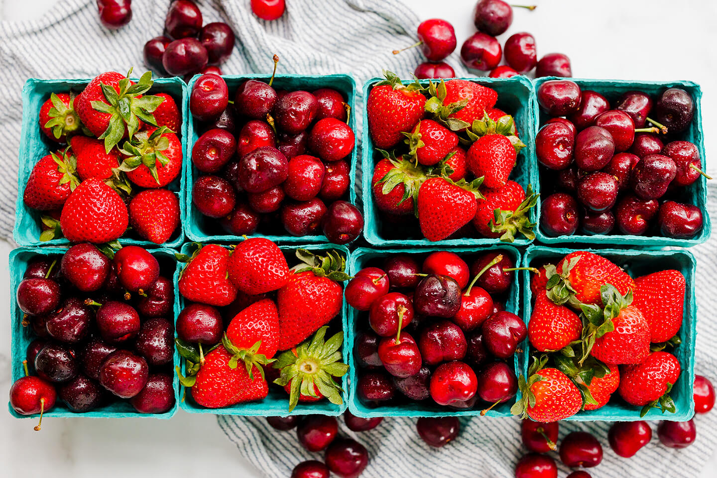 pints of fresh cherries and strawberries