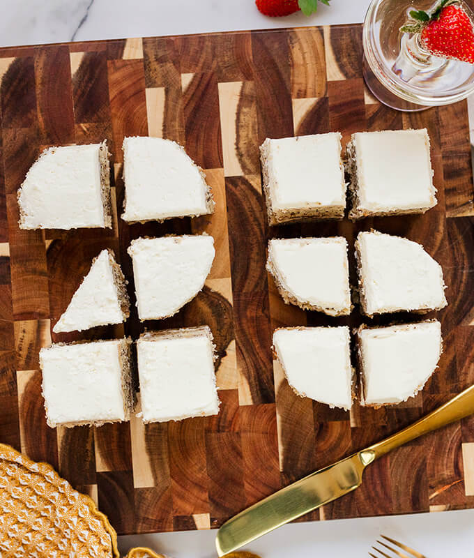 sliced banana cake cut in the shape of the numbers "25" displayed in a celebratory fashion.
